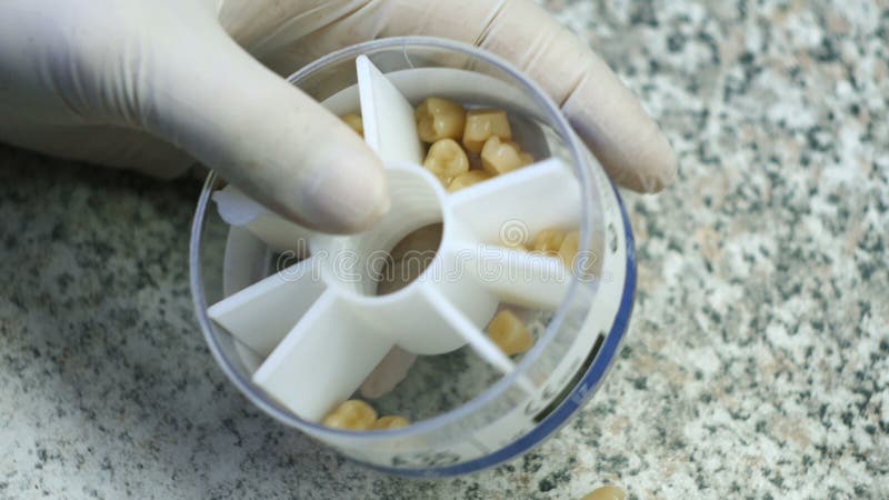 Closeup of a dental technician making of denture in a dental lab stock video