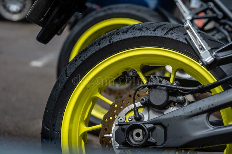 Closeup Detail of Motorcycle Rear Wheels and Brake Disc Image Stock