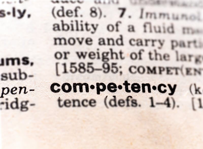 Closeup of the dictionary definition of the word competency stock photo