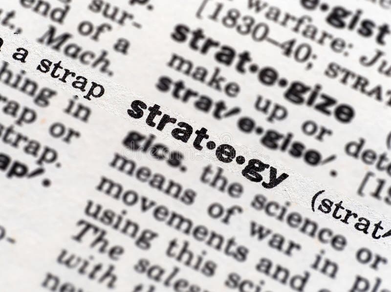 Closeup of the dictionary definition of the word strategy stock images