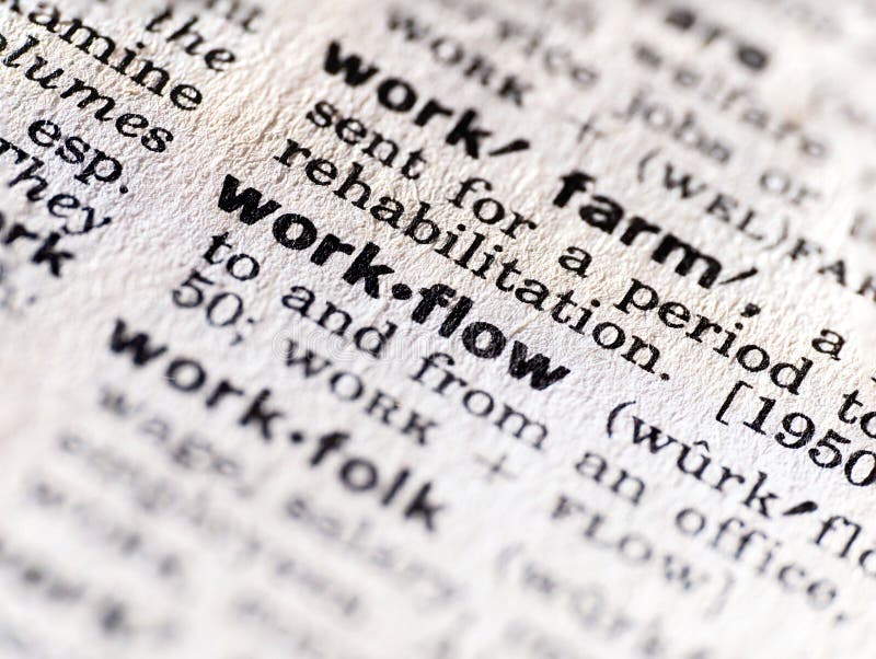 Closeup of the dictionary definition of the word workflow stock photo