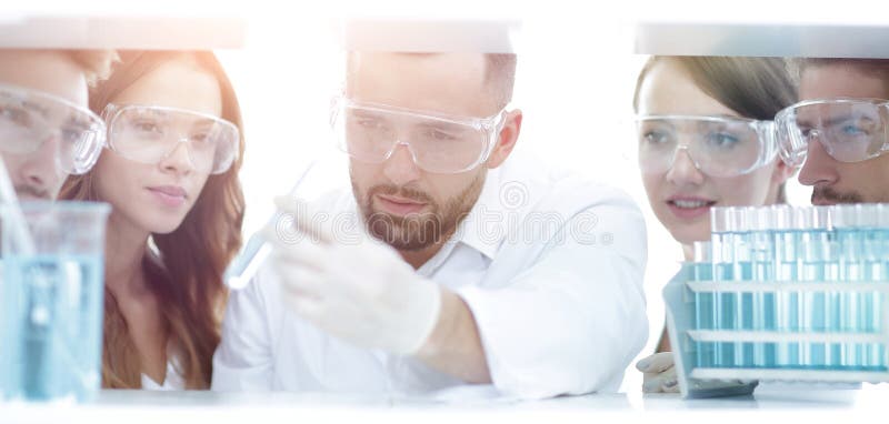 Closeup of a doctor-pharmacists and colleagues working in the laboratory.the concept of the study.