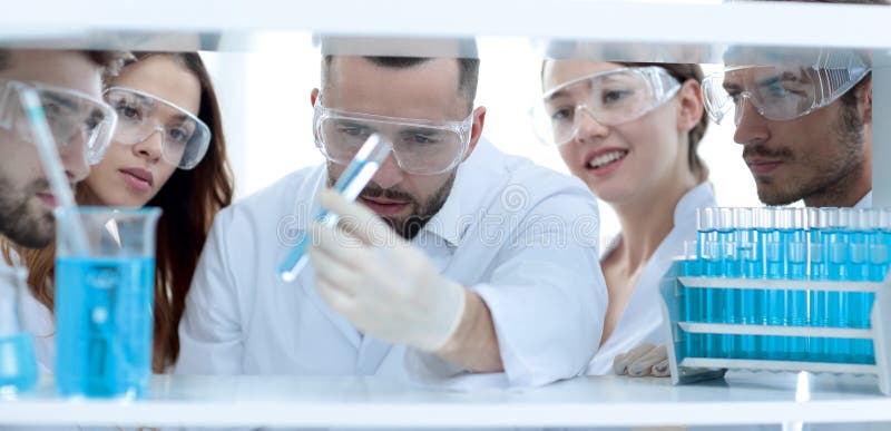 Closeup of a doctor-pharmacists and colleagues working in the laboratory.the concept of the study.