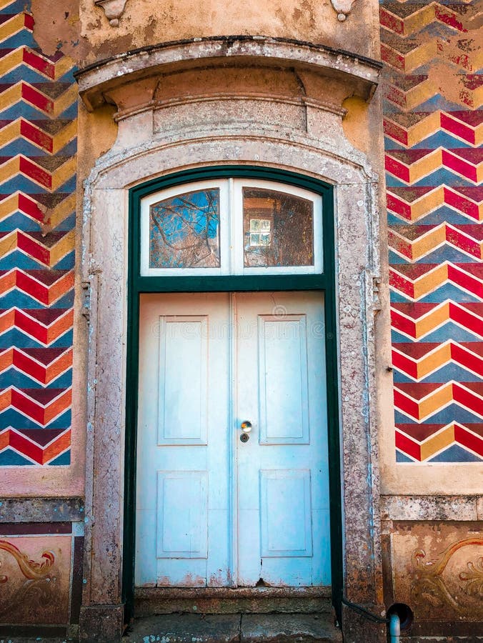 A closeup of a door of a beautiful building