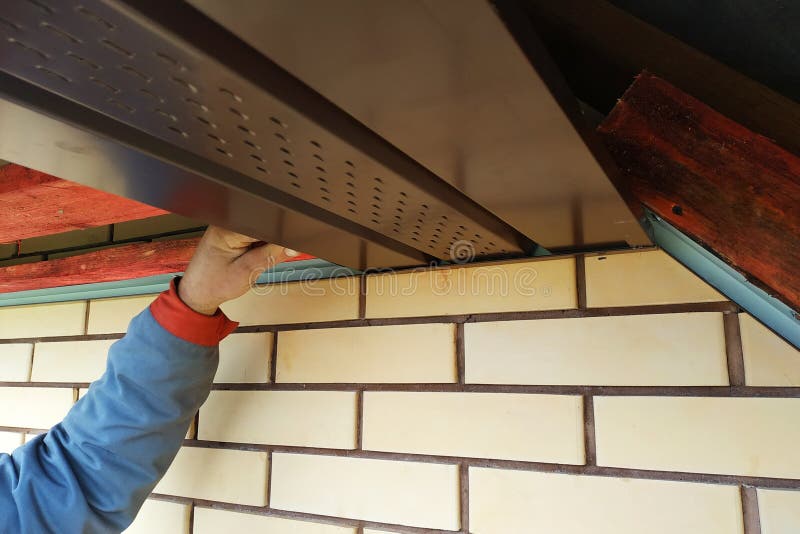 Closeup of eaves hanging in newly built houses stock photos