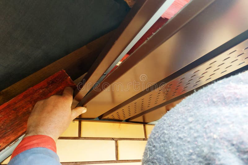 Closeup of eaves hanging in newly built houses stock photo