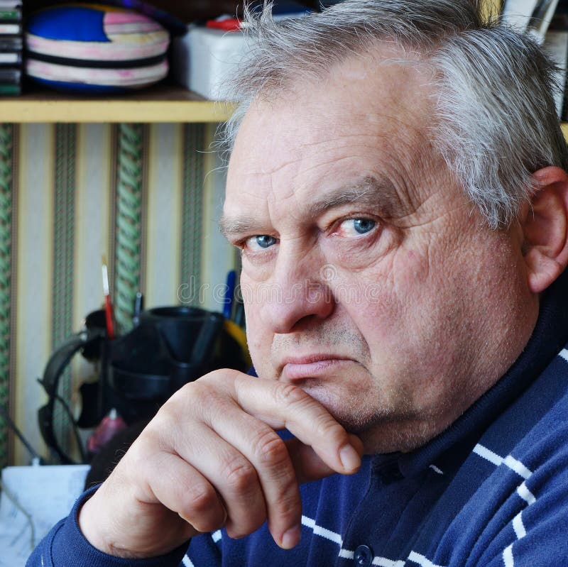 Portrait of sad elderly man