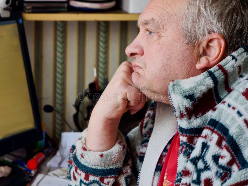 Portrait of sad elderly man