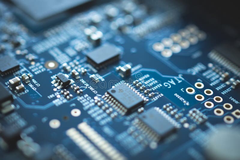 closeup of electronic device circuit board with processor background blue texture technology computer serve cpu motherboard chip stock image closeup of electronic device circuit board with processor background blue texture technology computer serve cpu motherboard chip stock image