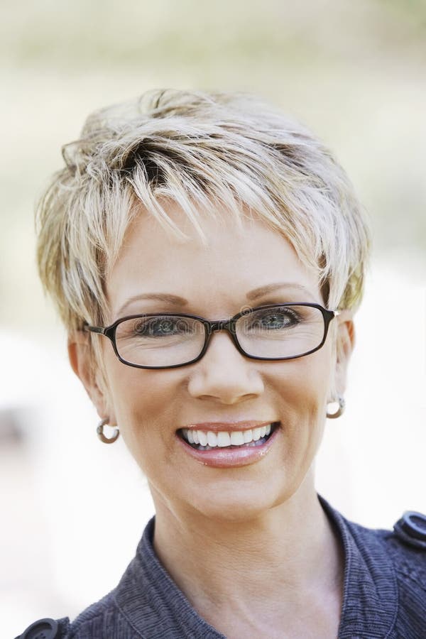 Closeup Of Elegant Woman Wearing Glasses royalty free stock photo Closeup Of Elegant Woman Wearing Glasses royalty free stock photo