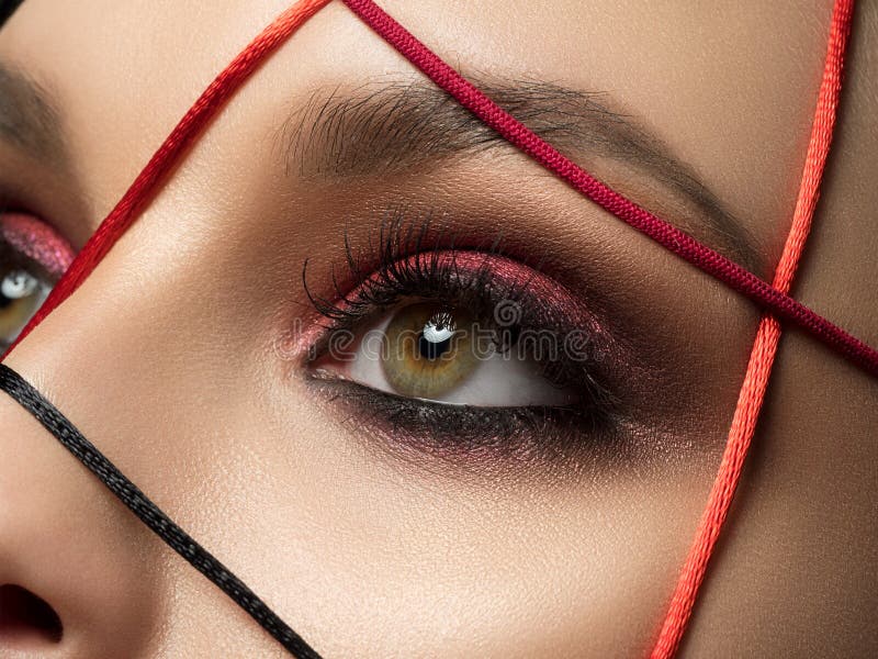 Beautiful Macro of Female Eye with Fashion Black Eyeliner Makeup
