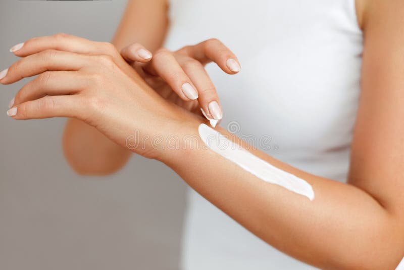 Closeup of Female Hands Applying Hand Cream.Hand Skin Care. Women Use Body  Lotion on Your Arms. Beauty and Body Care Concept. Stock Photo - Image of  hand, cosmetic: 136739840