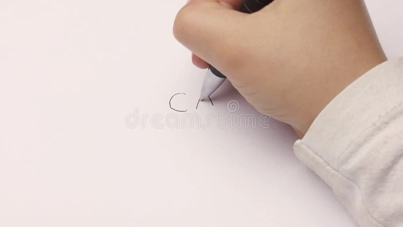Closeup female kid writing slow motion