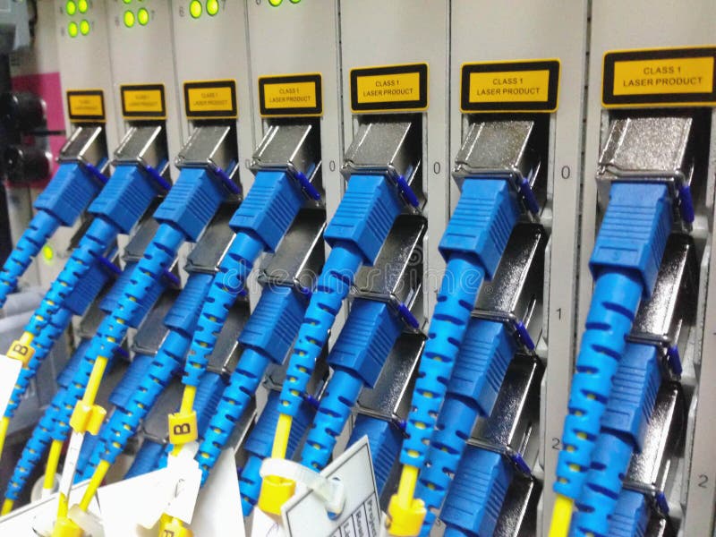 Closeup of fiber optical network cables patch panel stock photo
