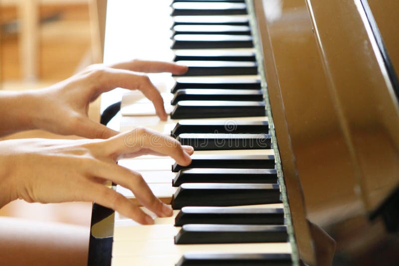 Closeup Of Fingers Playing Piano Stock Photo - Image of ...