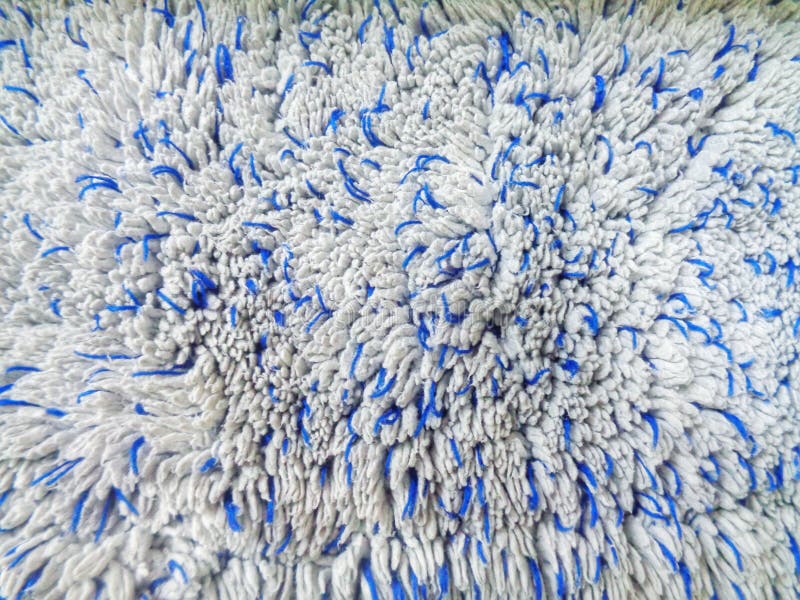 Closeup of a Fluffy Soft Blue and White Carpet Textu Stock Photo