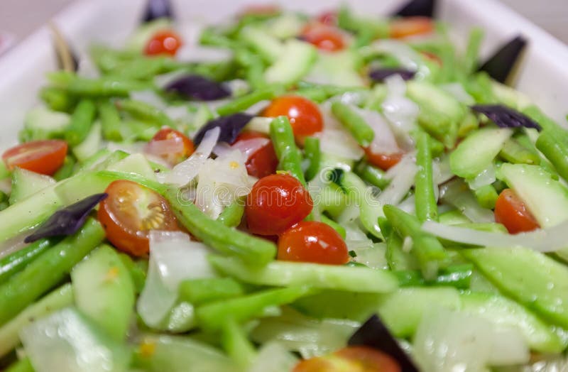 Closeup fresh salad in bufet tray.