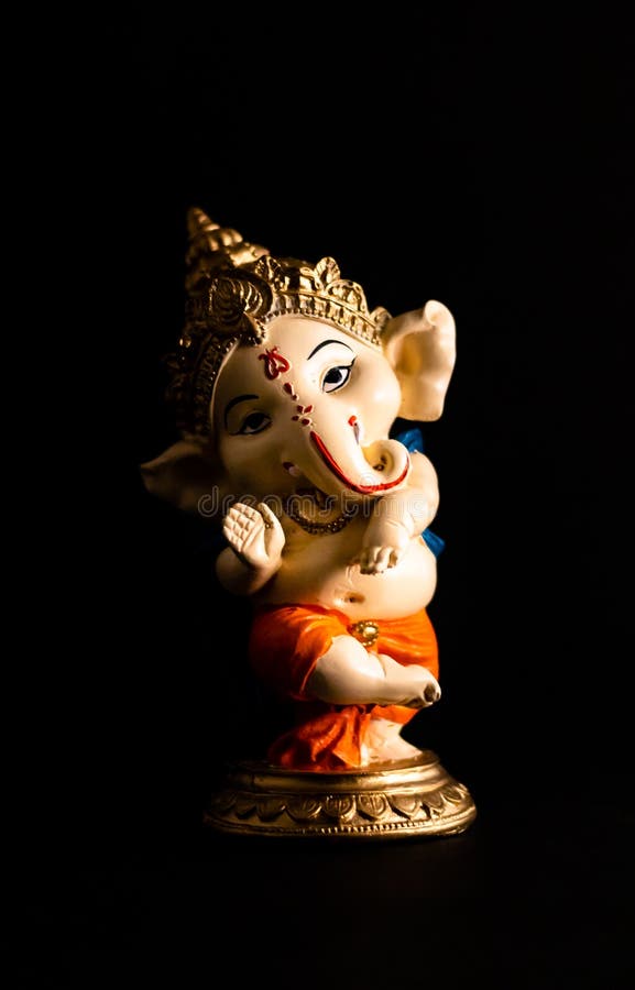 Closeup of Ganesha Statue on Black Background in Low Light. Religion  Concept Stock Image - Image of black, blessing: 170369929