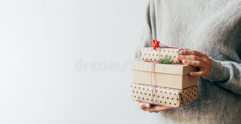 Closeup gifts in woman`s hand