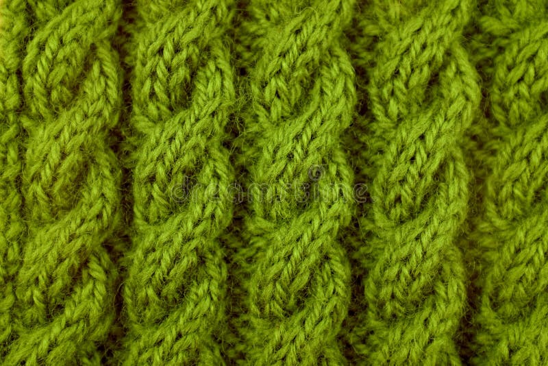 Closeup of green cable knitting stitch stock photography Closeup of green cable knitting stitch stock photography