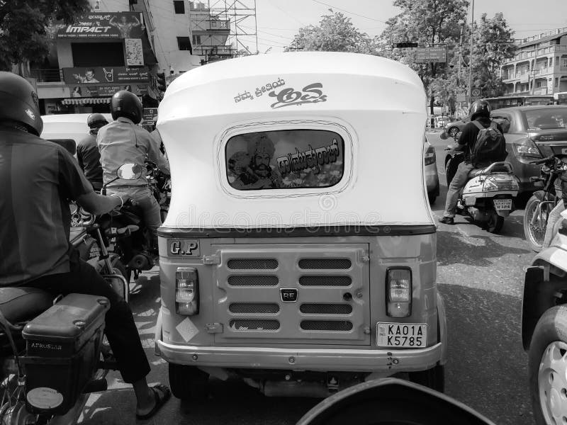 Closeup of Green and Yellow color Auto Rickshaw Back View. Bangalore, Karnataka/India-May 20 2020: Closeup of Green and Yellow color Auto Rickshaw Back View royalty free stock images