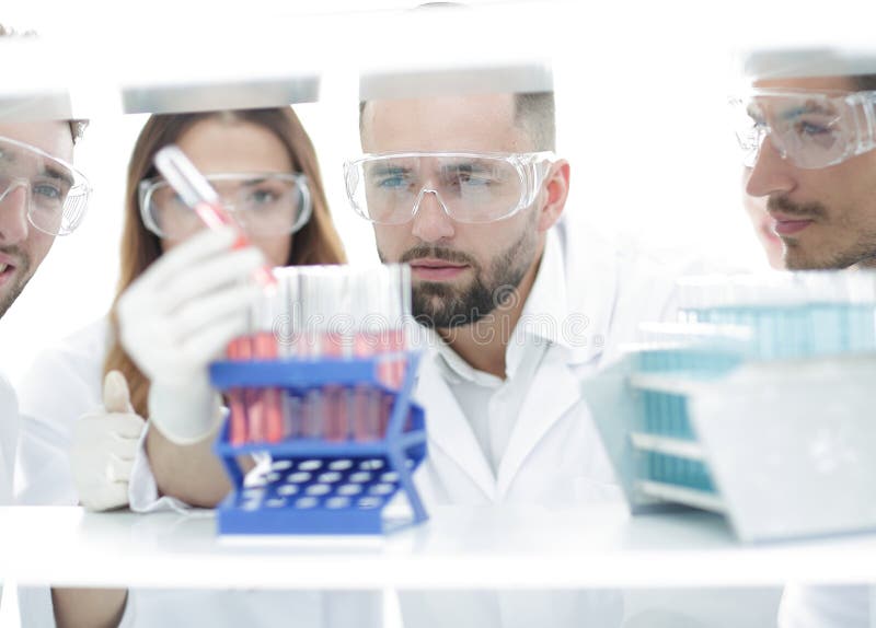 Closeup of a Group of Scientists and Pharmacists in the Laboratory