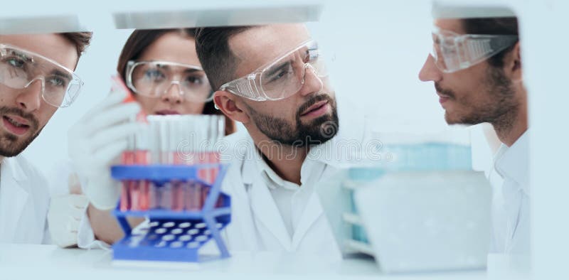 Closeup of a Group of Scientists and Pharmacists in the Laborato Stock