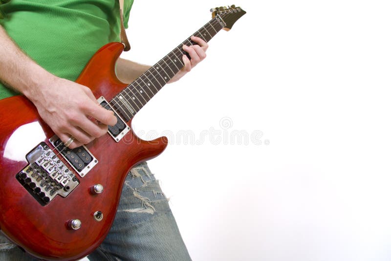 Closeup of a guitarist playing sn electric guitar