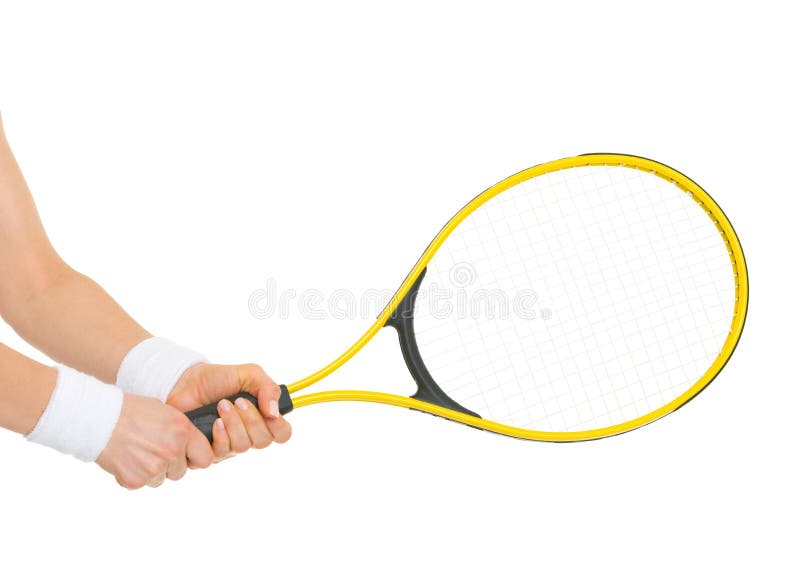 Closeup on hand of tennis player holding racket