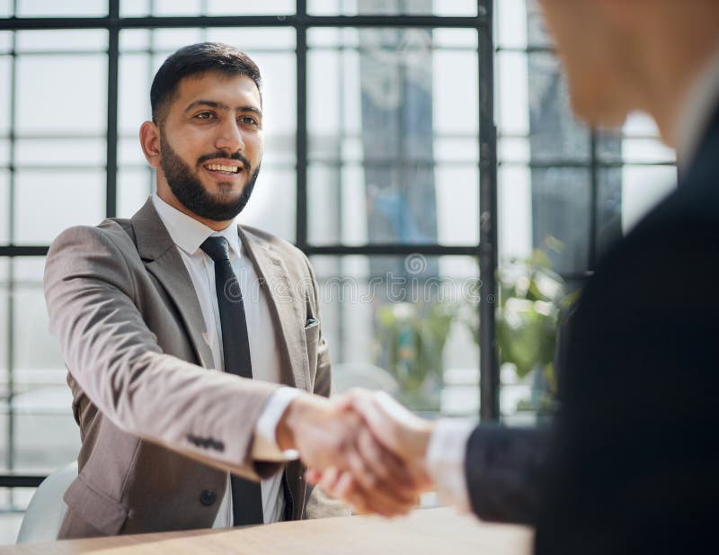Closeup of handshake of business partners royalty free stock photo