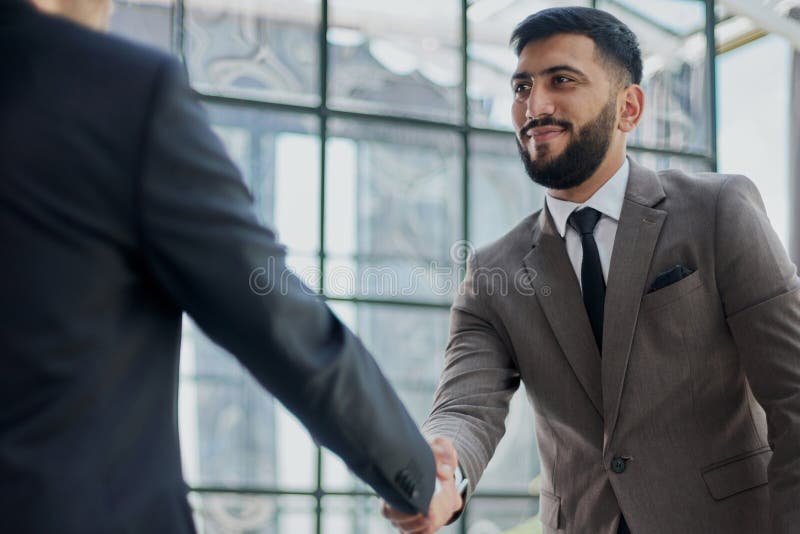 Closeup of handshake of business partners royalty free stock photography