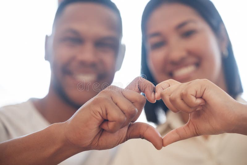 Closeup Of Happy Mixed Race Couple Forming Heart Shape With Hands Two Lovers Showing Heart Sign