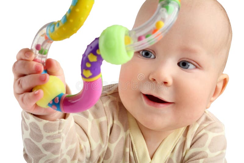 Closeup of happy seven months baby boy grabbing a toy isolated. stock photo Closeup of happy seven months baby boy grabbing a toy isolated. stock photo