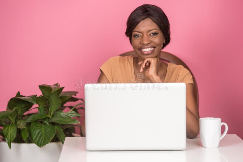 Closeup of happy young woman using laptop. stock image Closeup of happy young woman using laptop. stock image