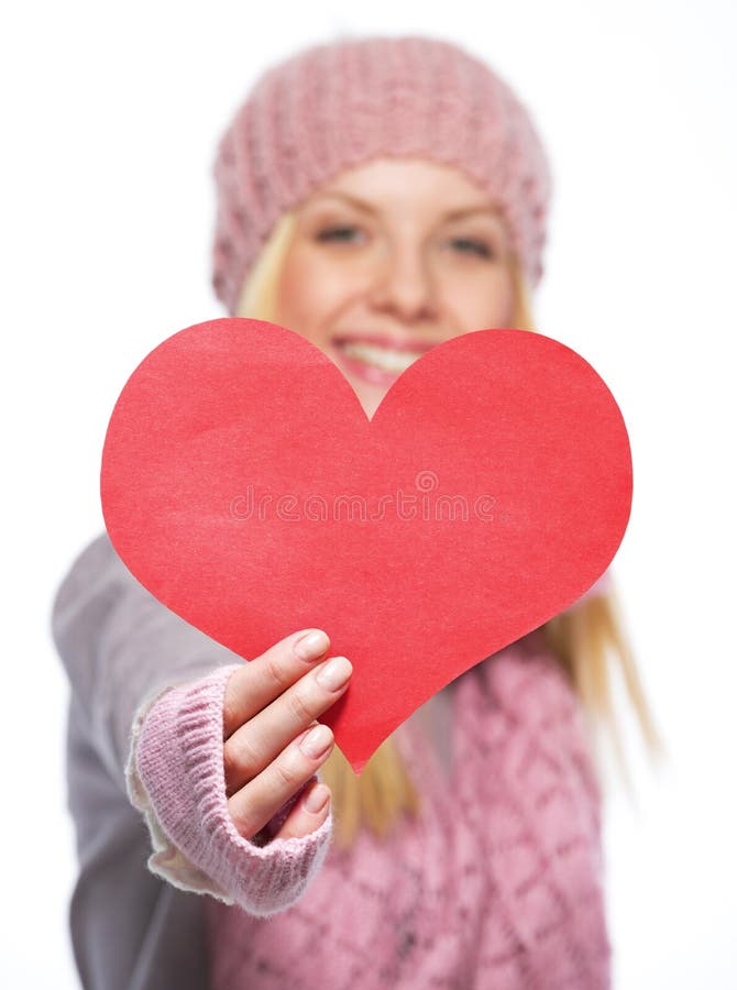 Closeup on heart shaped postcard in hand of teenager girl stock images Closeup on heart shaped postcard in hand of teenager girl stock images