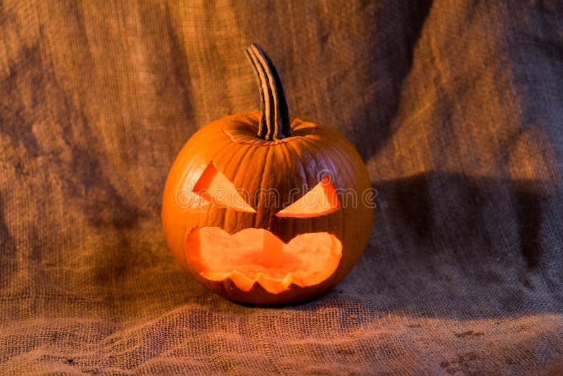 Scary Jack-o-lantern with Light Inside Close Up Stock Photo - Image of ...