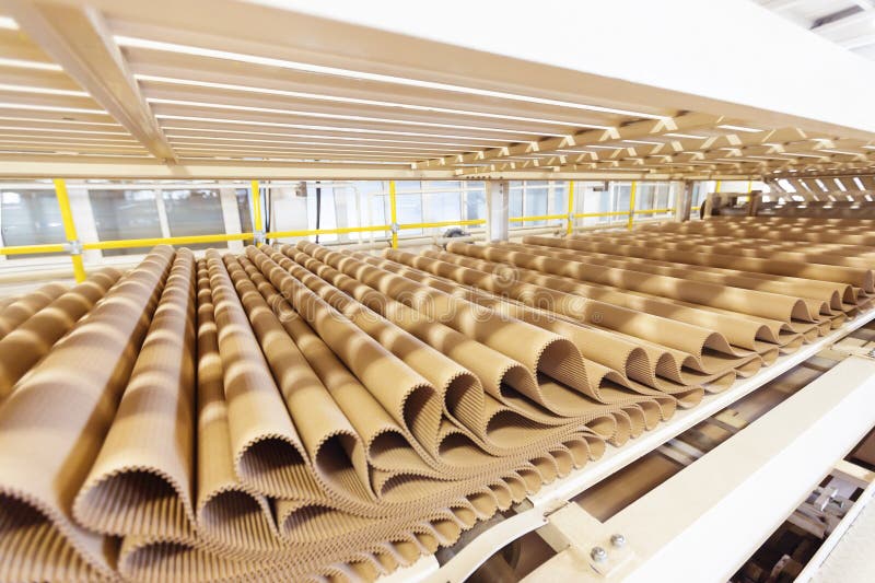 Closeup image of pleat cardboard row at factory background. Background package pattern stock images, royalty-free photos and pictures
