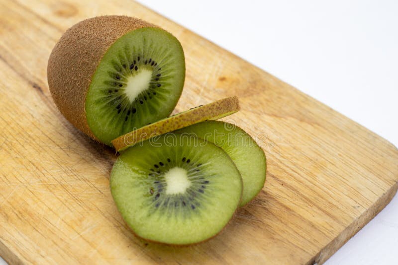Closeup Kiwi Fruit Slice on the Old Wood Butcher Stock Photo Image of