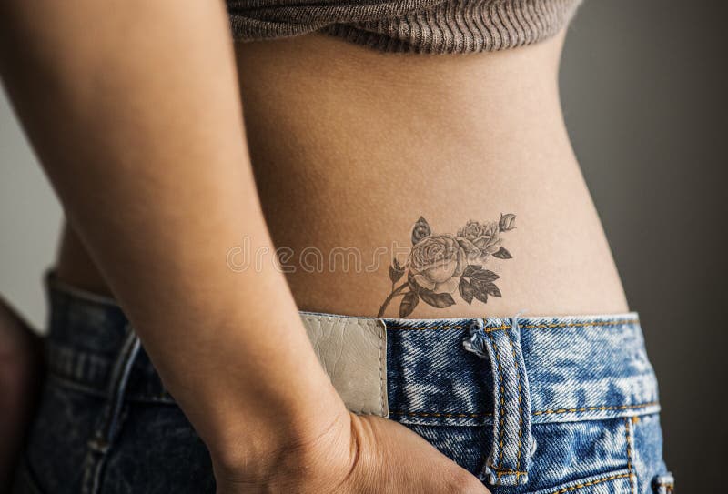 Closeup of Lower Hip Tattoo of a Woman Stock Photo - Image of beautiful,  lifestyle: 110811138