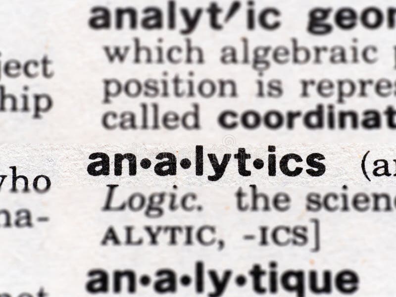 Closeup of the word analytics in the dictionary royalty free stock photos