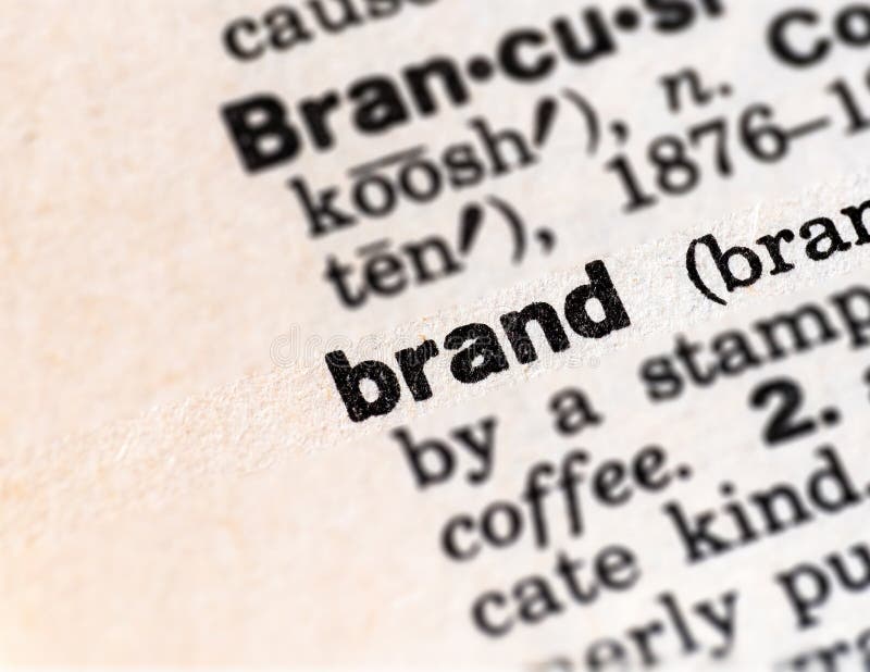 Closeup of the word brand in the dictionary. A closeup, macro image of the word brand in the dictionary