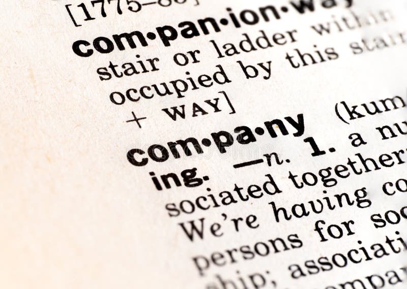 Closeup of the dictionary definition of the word company royalty free stock photo