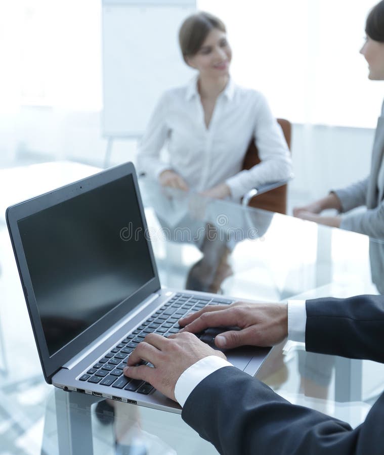 Closeup of male hands typing on a laptop. stock image Closeup of male hands typing on a laptop. stock image