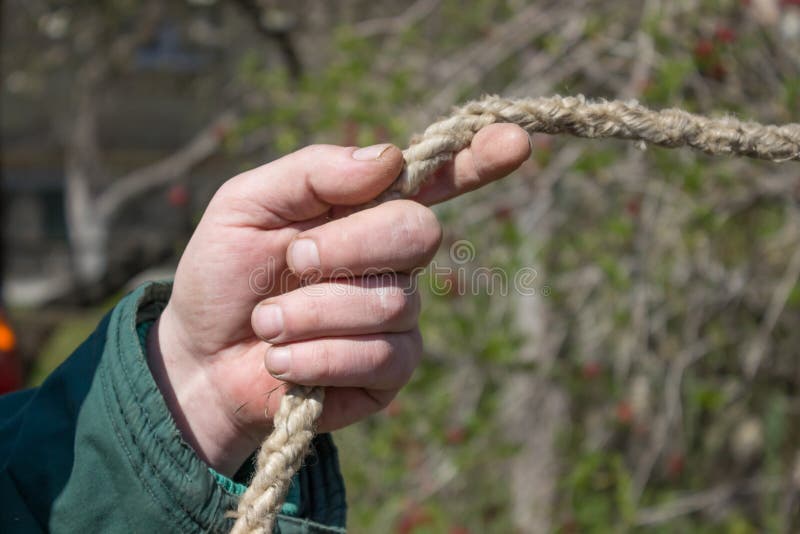 Hand gripping rope stock image. Image of caucasian, twisting 19443843