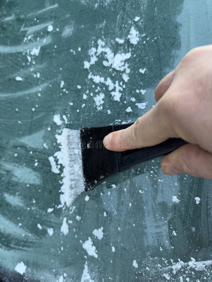 Hand Scratching Ice From Car Window Stock Photo - Download Image