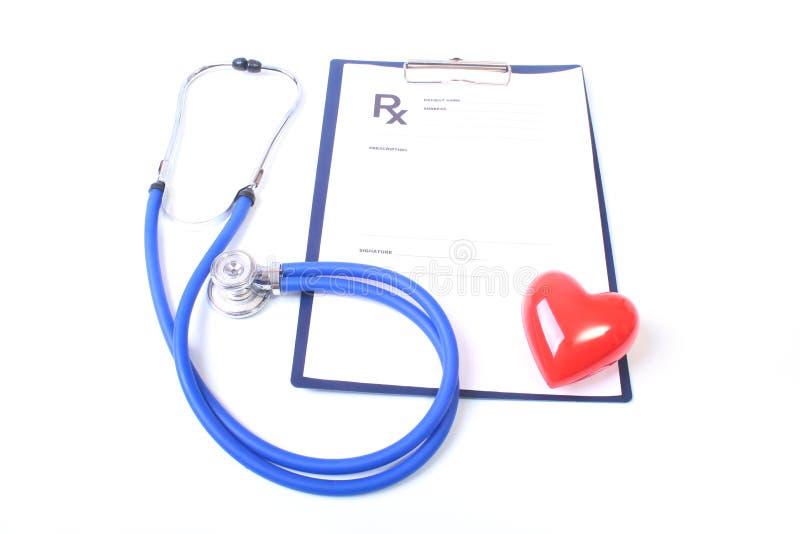 Closeup of medical stethoscope on a rx prescription, red heart on white background