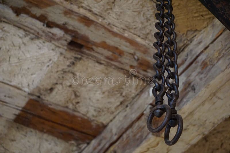 Closeup of a Metallic Chain Hung from a Roof Stock Image Image of