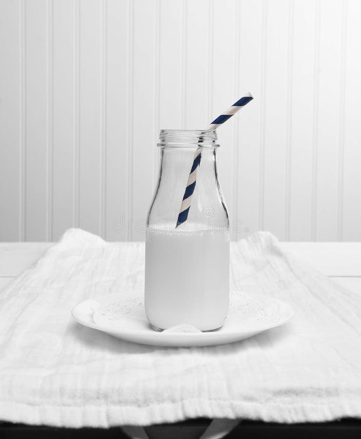 Milk Bottle with Drinking Straw on White Stock Image Image of beverage, doiley 99857953