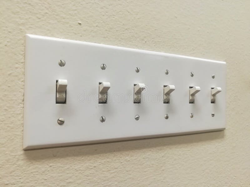 Multiple Light Switches Grouped Together