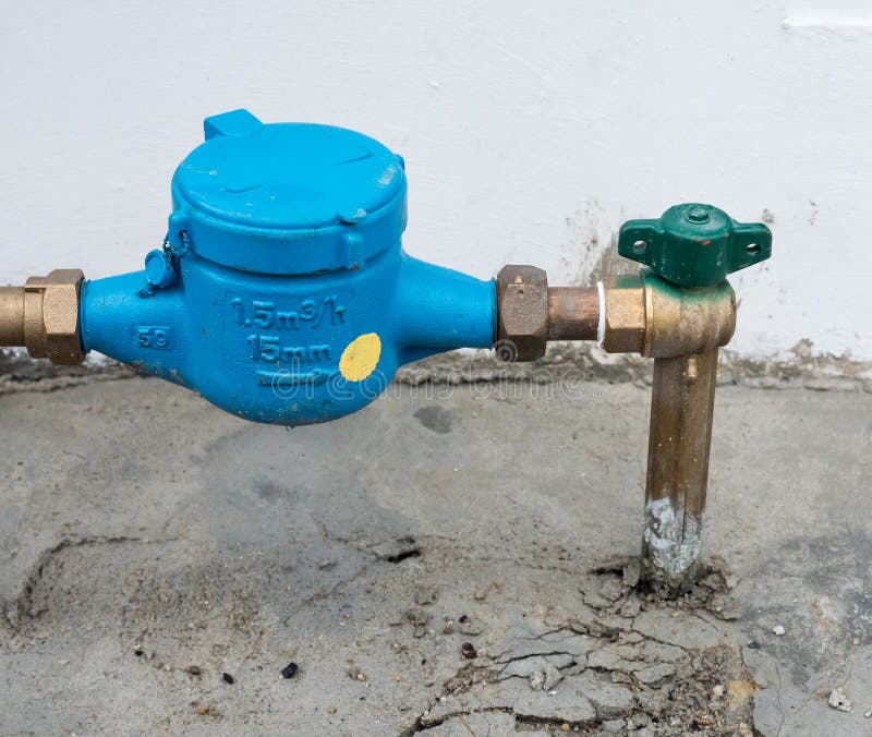 Closeup Of The New Water Meter. Stock Image - Image of brass, liquid Water Meter On Side Of House